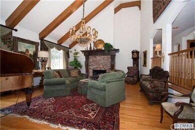 Large living room, custom fireplace, cathedral  ce