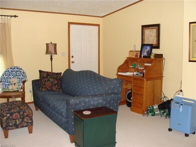 living room has cathedral ceiling