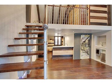 Living Room. Living room w/stairs going up to mast