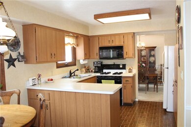 Eat-in kitchen features plenty of counter space to