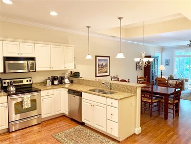 Kitchen with granite countertops, smooth top oven/