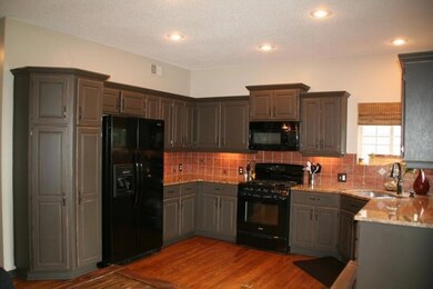 Beautiful painted cabinetry and woodwork in kitche