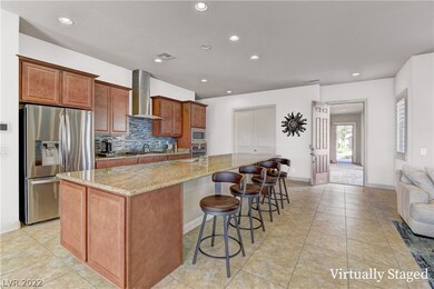 INVITING KITCHEN WITH OVERSIZED ENTERTAINERS ISLAN