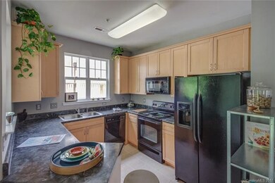 Great light filled kitchen, tiled floors, refriger