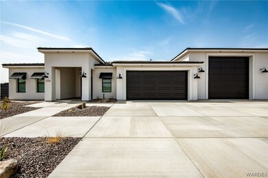 View of front of house featuring garage