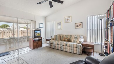 Step into the screened patio from the family room.