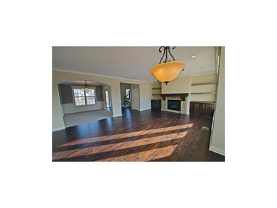 Open main floor with beautiful fireplace and built