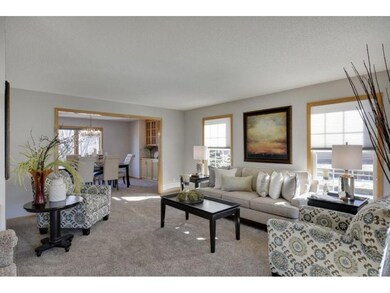 Formal living room graciously appointed and sun dr