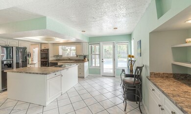 Kitchen w/ Pool View