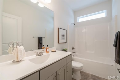Full bathroom with vanity and  shower combination