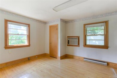 First Floor bedroom with wood flooring - great win