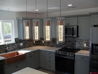 311 N Henry St, Cortez, CO 81321 - photo 2