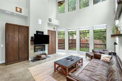 Living area featuring finished concrete floors, a