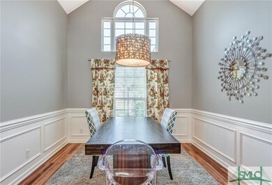 Arched opening greets you as you enter this beauti