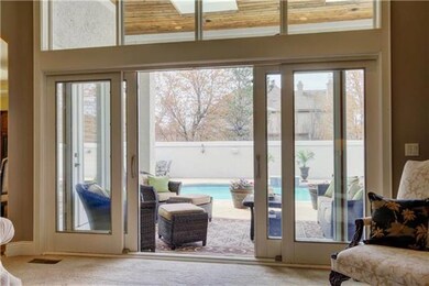 Living Room looks out on beautiful, private patio 