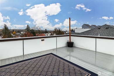Enjoy outdoor living with this spacious rooftop deck—perfect for BBQs, entertaining guests, or cultivating your own garden retreat. Plumbed with a gas line, it's ready for your grill or cozy fire pit gatherings.
