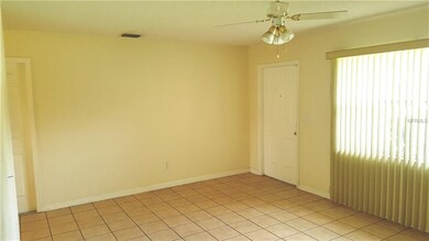 LIVING ROOM with front door and window