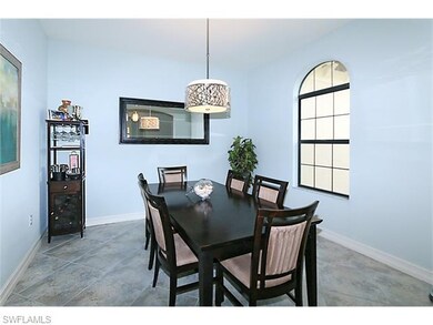 Formal Dining Room With Large Window And Natural L
