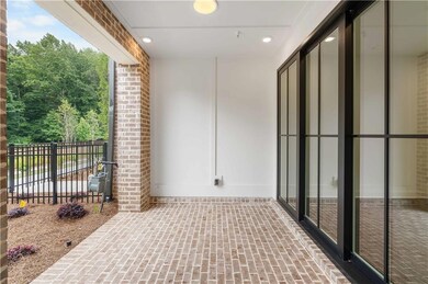 Slider doors from the patio open to the Media/Flex room offering the ultimate entertaining space.