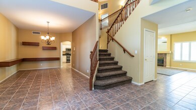 formal living room to staircase