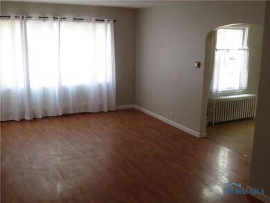 Spacious living room, architectural interest from