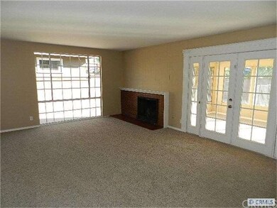 Nice Family Room with Brick Fireplace