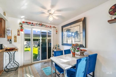 Dining room featuring a ceiling fan