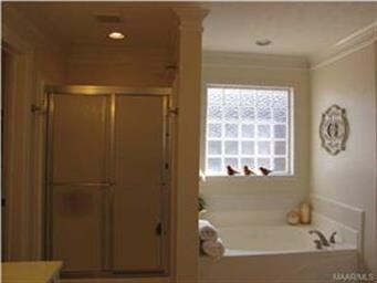 IT ALSO FEATURES A GARDEN TUB & SEPARATE SHOWER!
