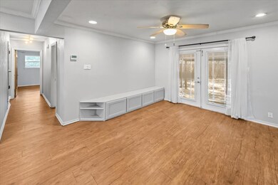 Dining room featuring ornamental molding, recessed lighting, light wood finished floors, ceiling fan, and French doors