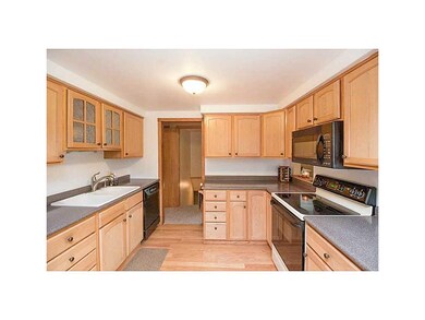 Kitchen. Oak cabinet w/updated hardware and hardwo