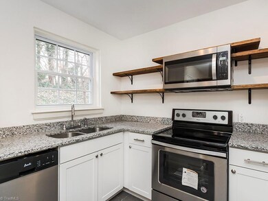 Undermount sink with window above! Dishwasher and new cabinets!
