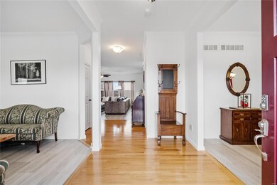 Welcoming Entry with Wood Floor