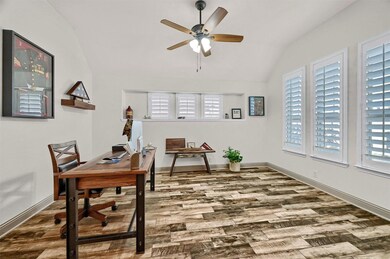 The first room to the right of the entry is currently used as an office but would also work well as an additional living or dining area!