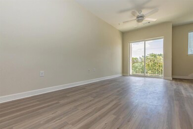 Unfurnished room with baseboards, visible vents, 