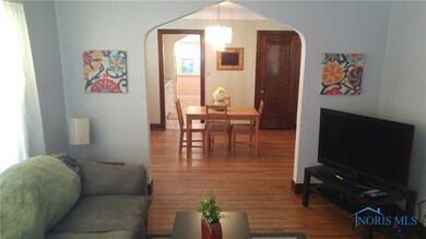 Living Room opens to Formal Dining Room