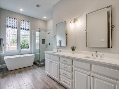 WOWZA! Gorgeous updated master bath includes  quar