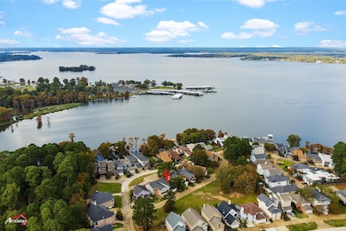 Aerial view of residential area with a nearby body of water