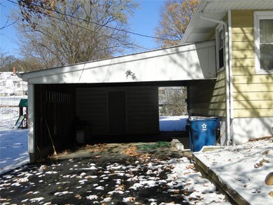 Attached Carport with Basement Entrance