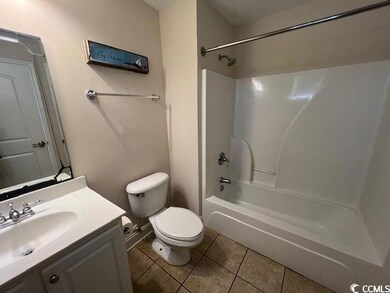 Full bathroom featuring vanity, toilet, washtub / 