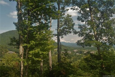 Long range views from this one-of-a-kind home site