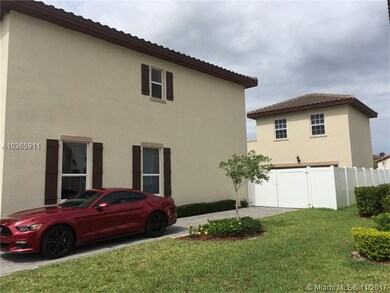 SIDE VIEW WITH GUEST HOUSE BEHIND HOUSE