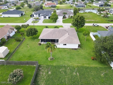 Aerial view of residential area with a nearby body