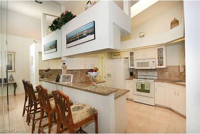 Breakfast bar into kitchen