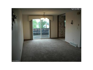 Dining room with sliding glass doors that lead to 