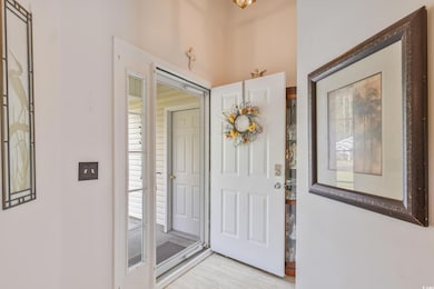 Entryway featuring wood finished floors