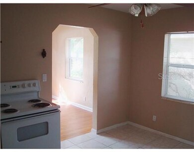 Kitchen - Arched doorways lend an extra charm to this home.