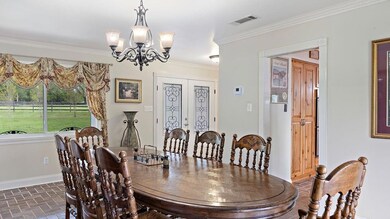 Foyer, dining room kitchen to the right.
