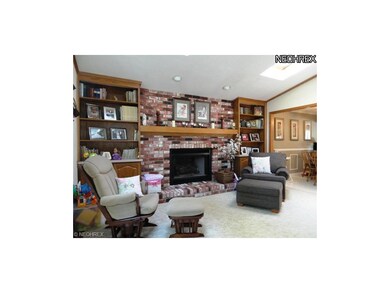 Family room with fireplace and builtin book cases