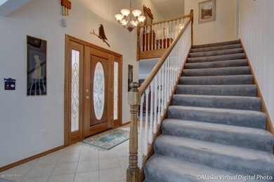 Grand Staircase Open To Foyer Below
