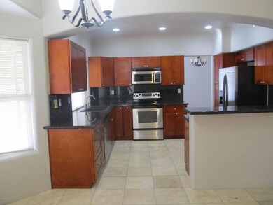 Kitchen with stainless steel appliances